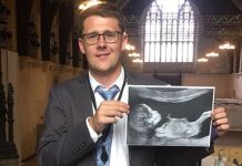 MP unveils baby scan in Commons in bid for parental leave proxy voting – UK