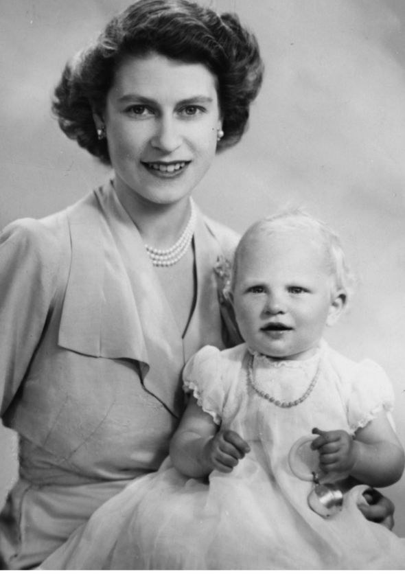 The queen with princess anne as a baby The queen with princess anne as a baby