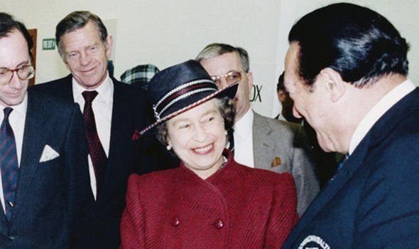 The Queen smiles while greeting Maxwell in the Eighties The Queen smiles while greeting Maxwell in the Eighties