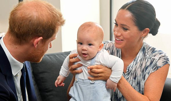 Prince Harry news: Duke and Duchess of Sussex holding Archie Prince Harry news: Duke and Duchess of Sussex holding Archie