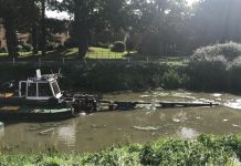 Dredging underway on Steeping River, Lincolnshire