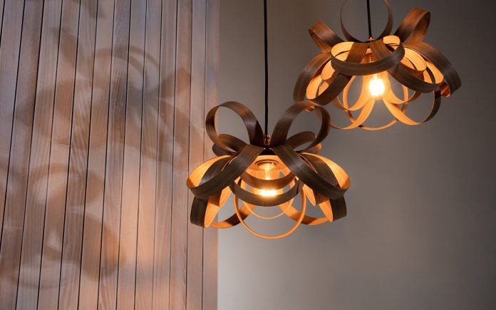 How can you decorate your small space with cluster lighting?
