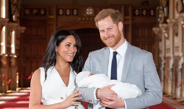 Meghan and Harry with Archie in May 2019 Meghan and Harry with Archie in May 2019