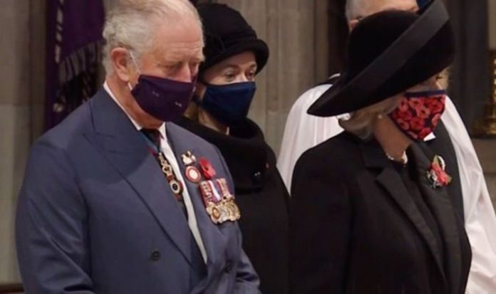 Masked Prince Charles lays wreath for Unknown Warrior at poignant Remembrance Day service | Royal | News