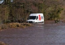 Christmas DPD Delivery driver STRANDED after torrential downpours caused flash flooding | UK | News (Reports)