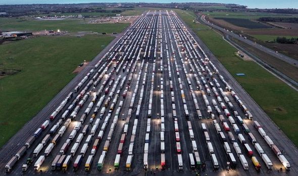 Lorries and heavy goods vehicles parked on the tarmac at Manston Airport near Ramsgate