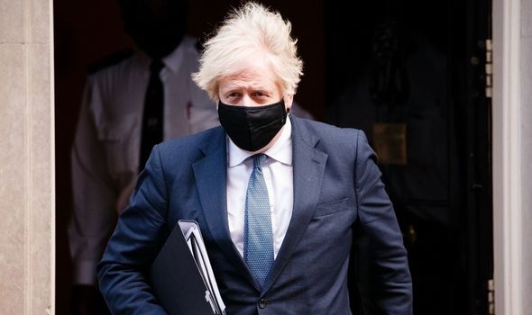Boris Johnson leaving Downing Street 
