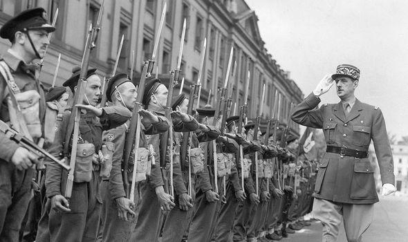 Charles de Gaulle inspects troops
