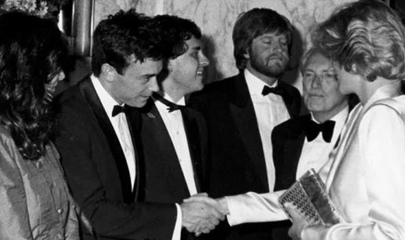 Maxwell (L) and Diana (R) meeting at the 1984 premiere of Indiana Jones and the Temple of Doom