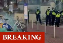 Wales chaos: Furious protests erupt in Cardiff as angry crowd hurl smoke bombs at police (Reports)