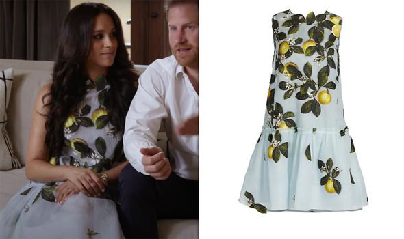 Meghan with Harry in the Spotify promo wearing a designer dress which includes a nod to a historical painting Meghan with Harry in the Spotify promo wearing a designer dress which includes a nod to a historical painting