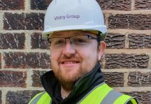 BuildForce: shaping military skills for a career in construction – Case study David Duncan in a white hard hat smiling straight at the camera.