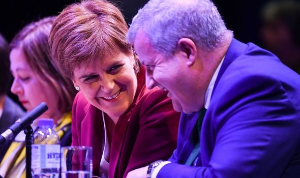 Ian Blackford alongside SNP leader Nicola Sturgeon Ian Blackford alongside SNP leader Nicola Sturgeon