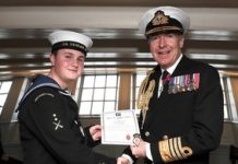 John Challenger talks about the importance of doing his bit to help other cadets – Case study Sea cadet John Challenger being awarded a British Empire Medal (BEM) dressed in full service uniform.