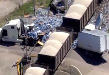 Semi carrying water bottles split in half by train (Video) Semi carrying water bottles split in half by train (Video)