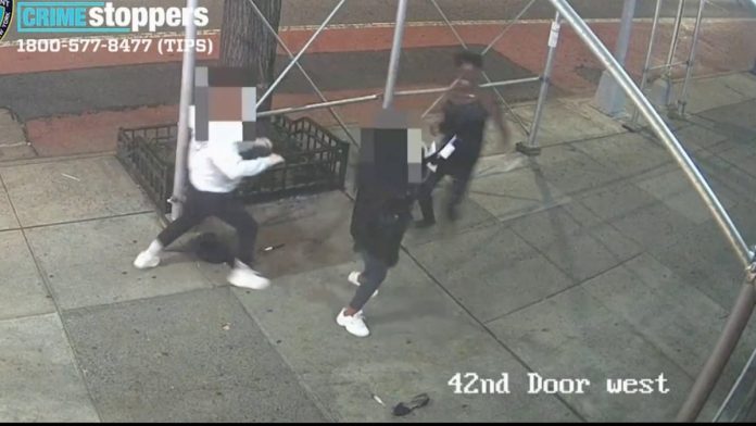 Video shows stranger attacking Asian woman with hammer in NYC (Watch)