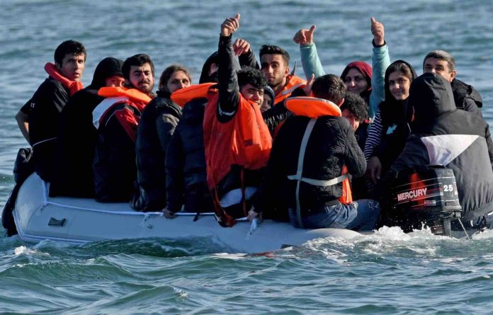 Patel orders probe after UK vessel brings migrants from French waters (Report)